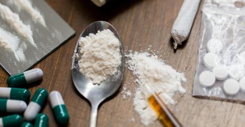 Photo of white powder and pills