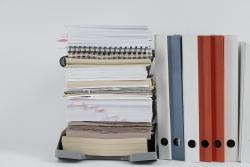 Pile of office records and folders