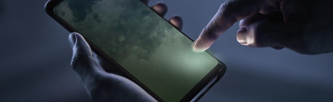 Hand holding a mobile phone