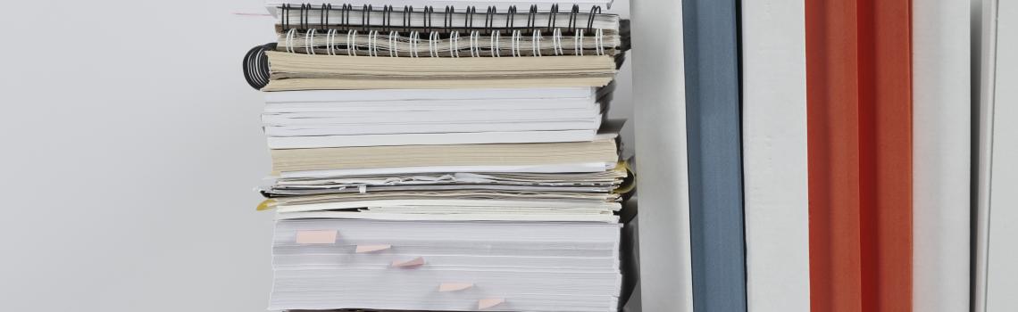 Pile of office records and folders